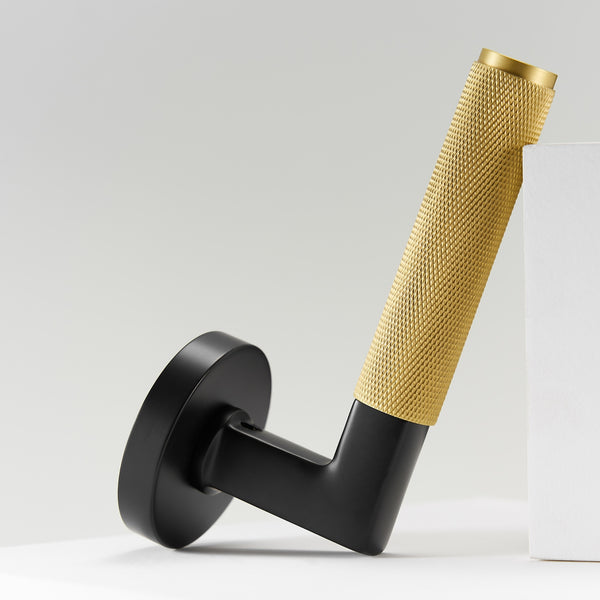 Door handle 308A-243 | Knurled | Black + Brass